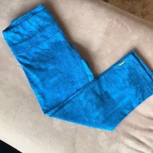 Blue Lucy Yoga crop leggings.